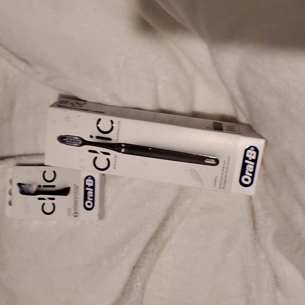 Click tooth brush with refill heads